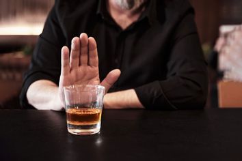 Man rejects a drink at the pub