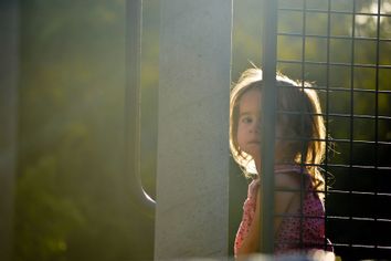 Sad little girl at the park