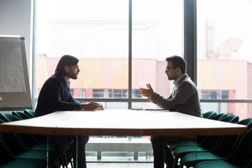 People in conversation meeting