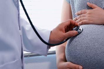 Doctor Examining Pregnant Woman