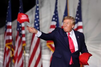 Donald Trump throwing hat