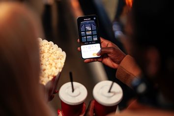 Woman at a movie theater