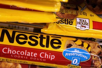Packages of Nestle Toll House chocolate chip cookie dough displayed on a shelf