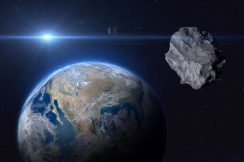 Planet Earth and asteroid in the space, concept