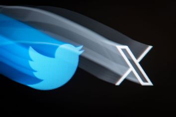 A longexposure shot of both old and new version of Twitter logo