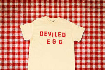 Deviled Egg shirt on a picnic blanket