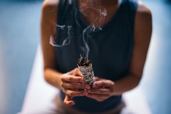 Woman Burning Sage Stick, Smudge Stick