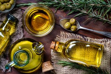 Olives and olive oil bottles