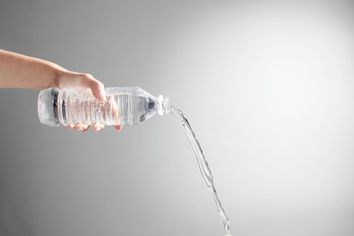 Pouring water from bottle