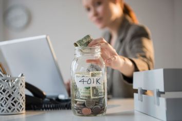 Putting money into 401K savings jar