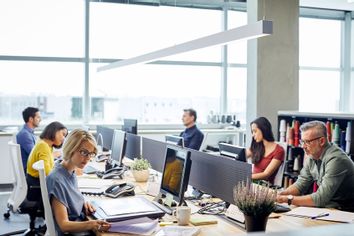 Business people working at desks