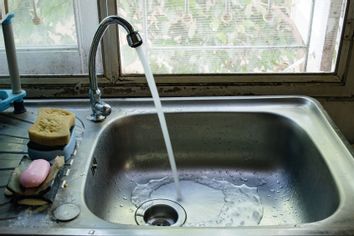 Water flow from a tap at a sink 