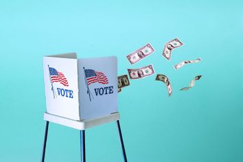 Dollar bills floating out of a voting booth