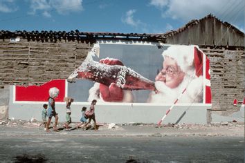Walking by Crumbling Christmas Coca-Cola Billboard Nicaragua