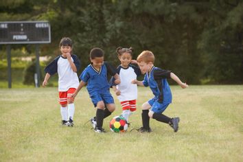 Children playing soccer