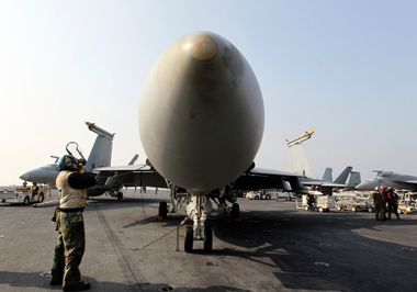An F/A-18 Hornet fighter jet sits onboard the U.S. Navy's USS George Washington aircraft carrier during joint military drills between the U.S. and South Korea in the West Sea