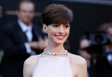 Anne Hathaway, best supporting actress nominee for her role in "Les Miserables," arrives at the 85th Academy Awards in Hollywood
