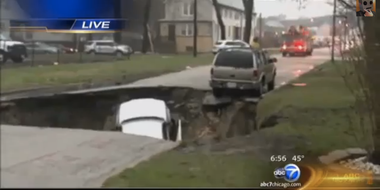 Image for Video: Chicago sinkhole eats three cars