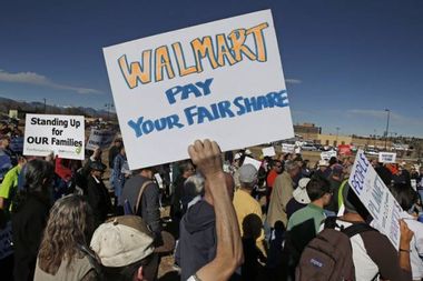 Image for Wal-Mart bumps its minimum wage to $9 an hour, but workers say it 