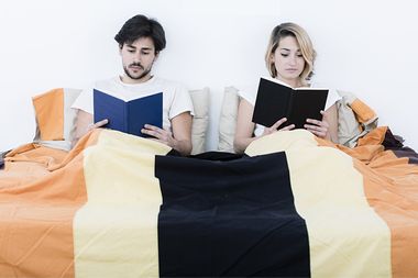Couple Reading in Bed