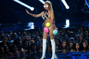Image for Miley Cyrus, mechanical MTV party machine: Even by low VMA standards, her manic eroticism and boring stunts failed to connect