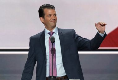 Donald Trump's son Donald Trump Jr. waves as he arrives to speak during the second session at the Republican National Convention in Cleveland
