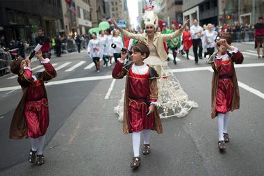 Boys dressed as Italian explorer Columbus march during annual Columbus Day Parade along Fifth Avenue in New York