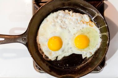 Two eggs fried in a skillet