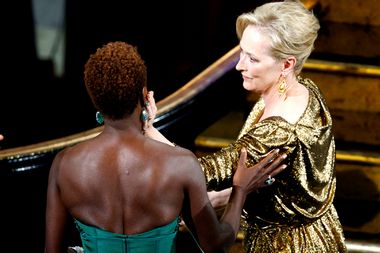 Streep, winner of the Oscar for best actress for her role in "The Iron Lady" is congratulated by fellow nominee Davis at the 84th Academy Awards in Hollywood