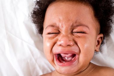 Face of crying African American baby