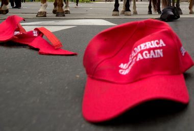 Pro Trump hats lie on the ground