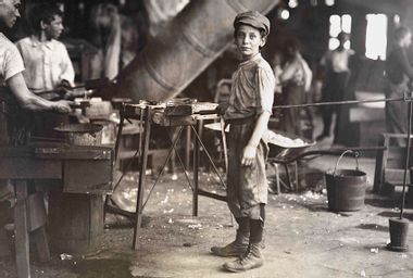 A carrying-in boy at a Virginia glass factory. He worked all night, every other week.