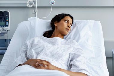 Woman in hospital bed