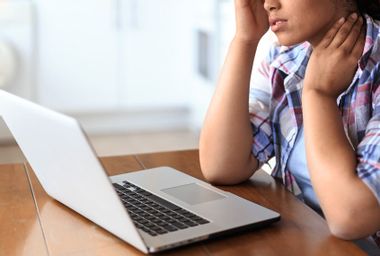 Woman Stressed At Computer