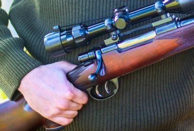 Guy Holding Rifle
