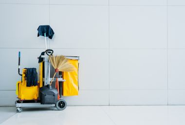 cleaning supplies with modern background and copy space for advertisement text.