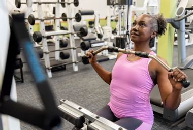 Woman weight training at the gym