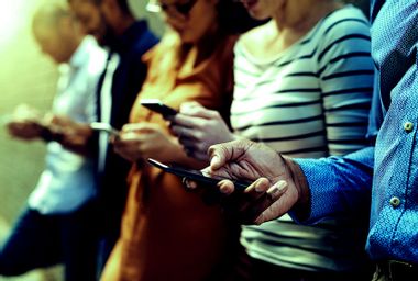 People scrolling through their phones