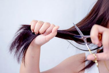Woman Cutting Hair