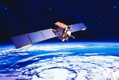 Communications satellite orbiting Earth
