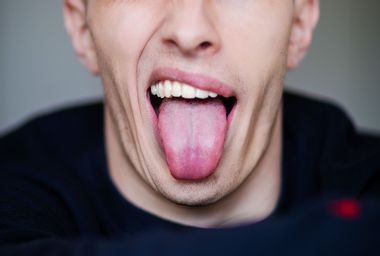 Man Sticking Out Tongue