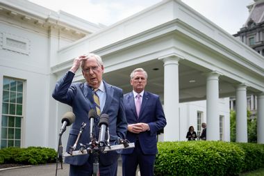 Senate Minority Leader Mitch McConnell (R-KY) and House Minority Leader Kevin McCarthy (R-CA) address reporters outside the White House after their Oval Office meeting with President Joe Biden on May 12, 2021.