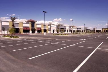 Empty strip-mall parking lott