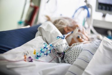 Infusion tubes are seen at the bedside of an intubated Corona patient in an intensive care room at the Asklepios Clinic