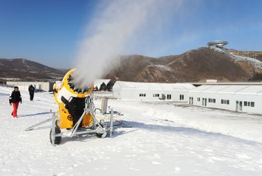  snowmaking machine works at the National Cross-Country Skiing Centre, for the Beijing 2022 Winter Olympics