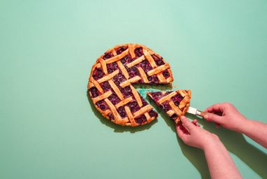 Person Holding Pie Slice