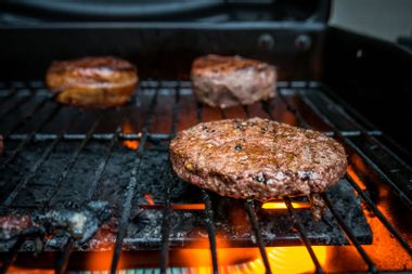 Burger Meat On Barbecue Grill