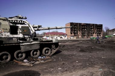 A destroyed Russian military vehicle is pictured on the street in the city liberated from Russian invaders, Trostianets, Sumy Region, northeastern Ukraine