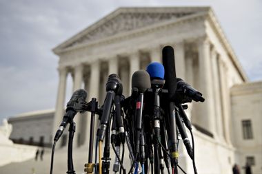 Television microphones stand outside the U.S. Supreme Court in Washington, D.C.