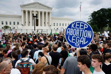 abortion-rights activists gather in front of the U.S. Supreme Court